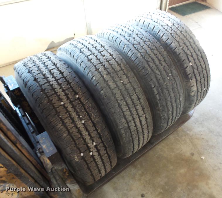 image for item EI9916 (4) 9.50R16.5LT tires and wheels