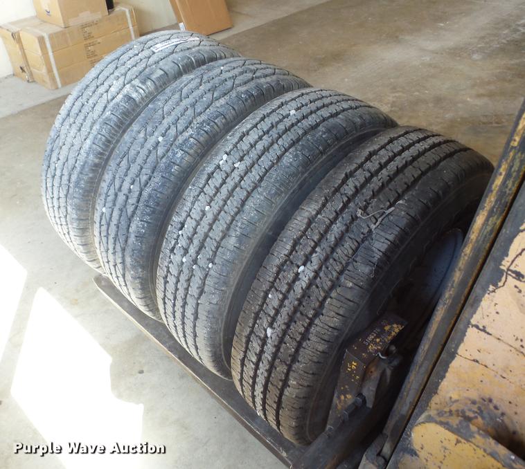 image for item EI9916 (4) 9.50R16.5LT tires and wheels