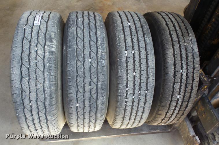 image for item EI9916 (4) 9.50R16.5LT tires and wheels