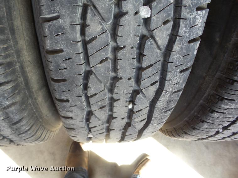 image for item EI9916 (4) 9.50R16.5LT tires and wheels