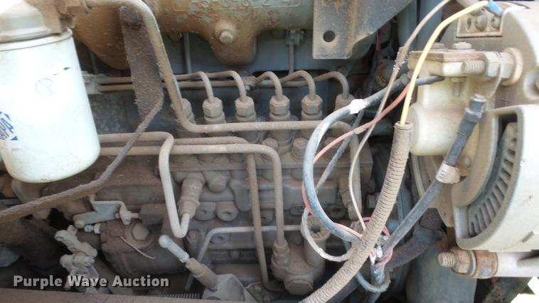 image for item ES9440 1991 Ford F800 digger derrick truck