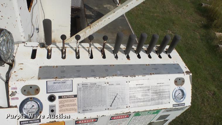 image for item ES9440 1991 Ford F800 digger derrick truck