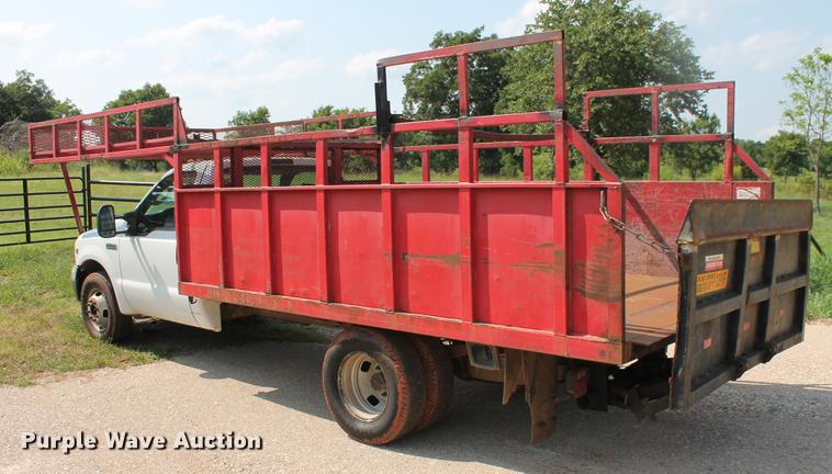 image for item DD5303 2006 Ford F350 Super Duty XL flatbed pickup truck