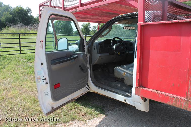 image for item DD5303 2006 Ford F350 Super Duty XL flatbed pickup truck