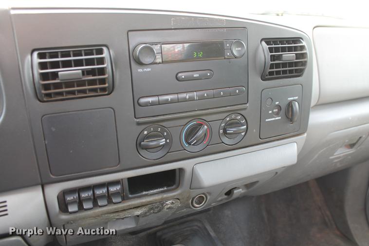 image for item DD5303 2006 Ford F350 Super Duty XL flatbed pickup truck