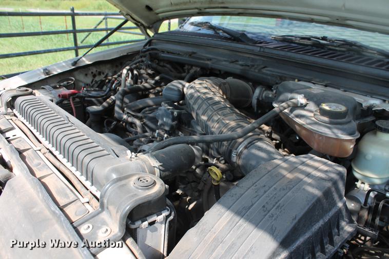 image for item DD5303 2006 Ford F350 Super Duty XL flatbed pickup truck