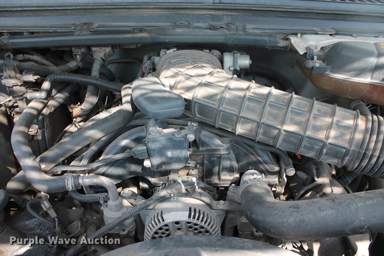 image for item DD5303 2006 Ford F350 Super Duty XL flatbed pickup truck