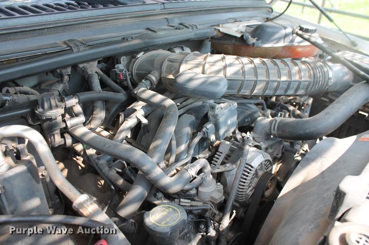 image for item DD5303 2006 Ford F350 Super Duty XL flatbed pickup truck