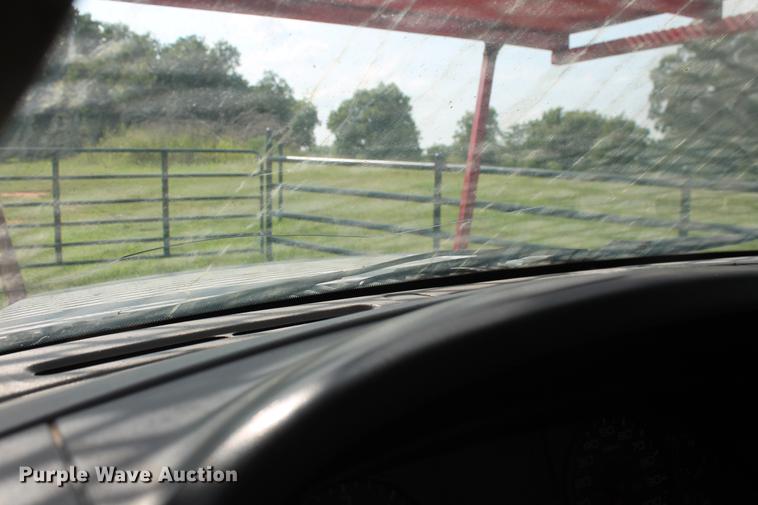 image for item DD5303 2006 Ford F350 Super Duty XL flatbed pickup truck