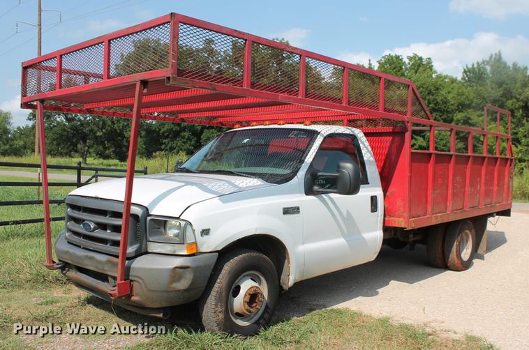 image for item DD5304 2002 Ford F350 Super Duty XL flatbed pickup truck