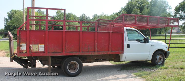 image for item DD5304 2002 Ford F350 Super Duty XL flatbed pickup truck