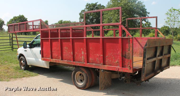 image for item DD5304 2002 Ford F350 Super Duty XL flatbed pickup truck