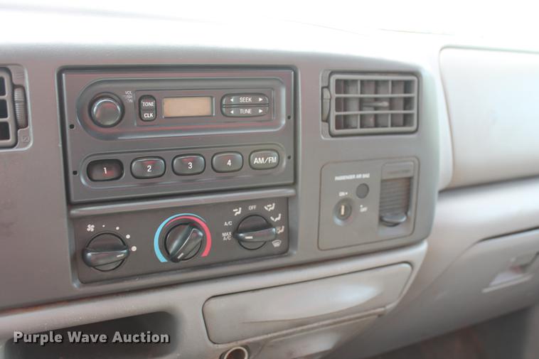 image for item DD5304 2002 Ford F350 Super Duty XL flatbed pickup truck