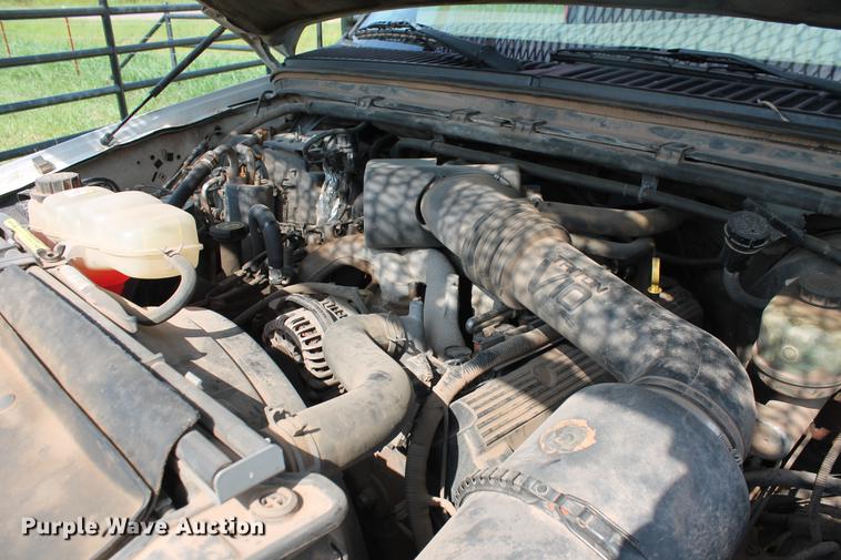 image for item DD5304 2002 Ford F350 Super Duty XL flatbed pickup truck