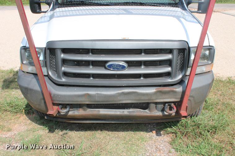 image for item DD5304 2002 Ford F350 Super Duty XL flatbed pickup truck