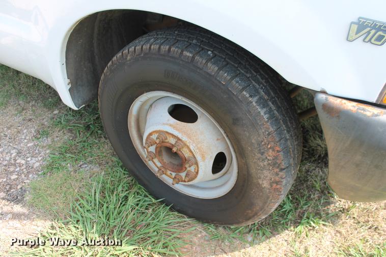 image for item DD5304 2002 Ford F350 Super Duty XL flatbed pickup truck