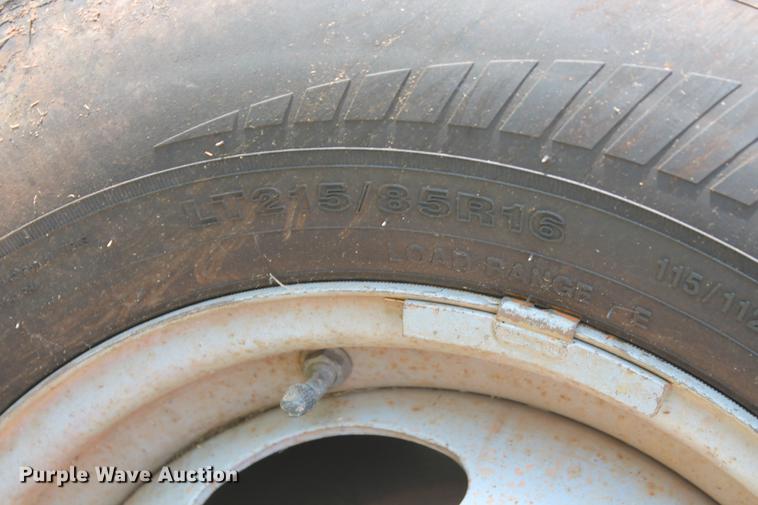 image for item DD5304 2002 Ford F350 Super Duty XL flatbed pickup truck