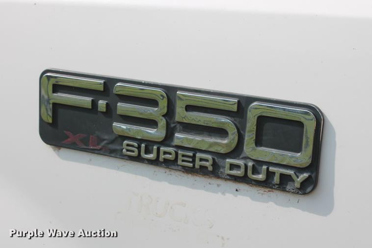 image for item DD5304 2002 Ford F350 Super Duty XL flatbed pickup truck