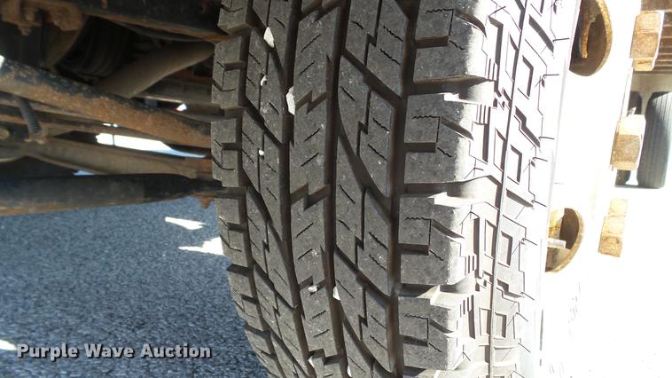 image for item DD7407 2003 Isuzu NPR dump flatbed truck