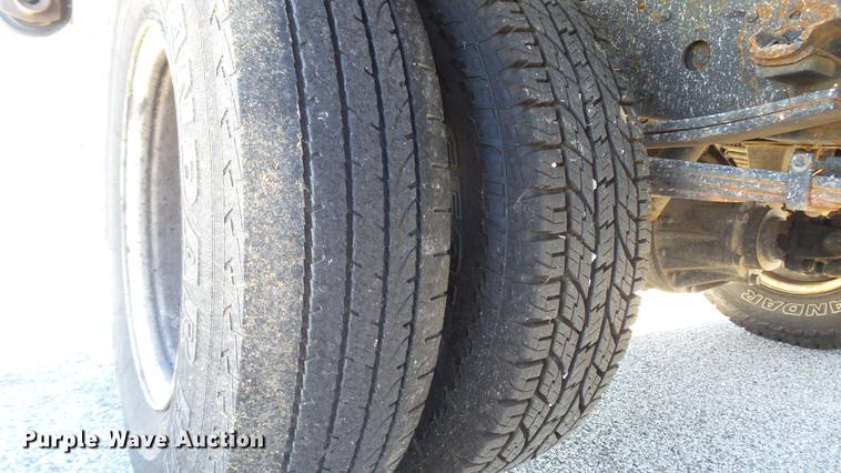 image for item DD7407 2003 Isuzu NPR dump flatbed truck