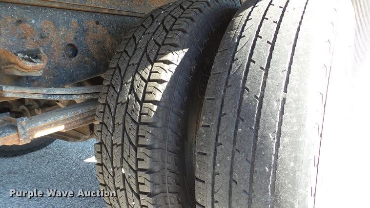 image for item DD7407 2003 Isuzu NPR dump flatbed truck