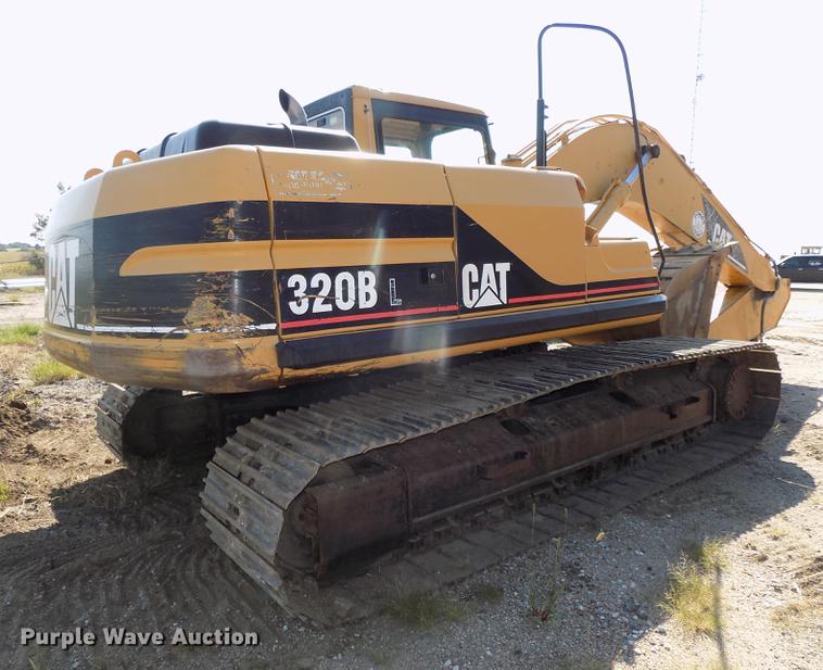 image for item DB8598 1999 Caterpillar 320B L excavator