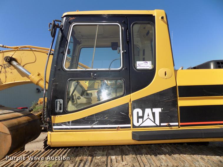image for item DB8598 1999 Caterpillar 320B L excavator