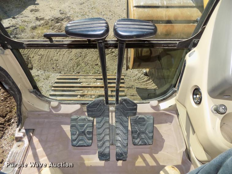 image for item DB8598 1999 Caterpillar 320B L excavator