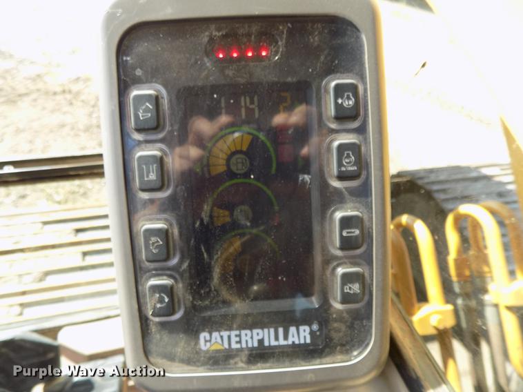 image for item DB8598 1999 Caterpillar 320B L excavator