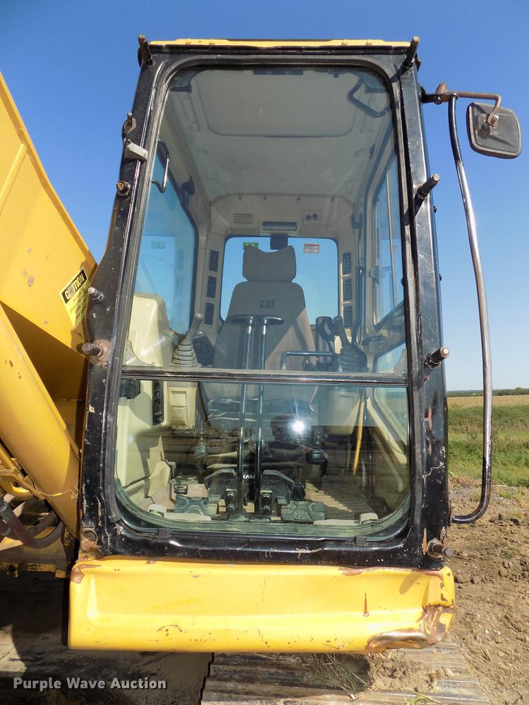 image for item DB8598 1999 Caterpillar 320B L excavator