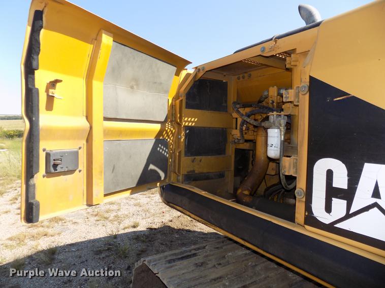 image for item DB8598 1999 Caterpillar 320B L excavator