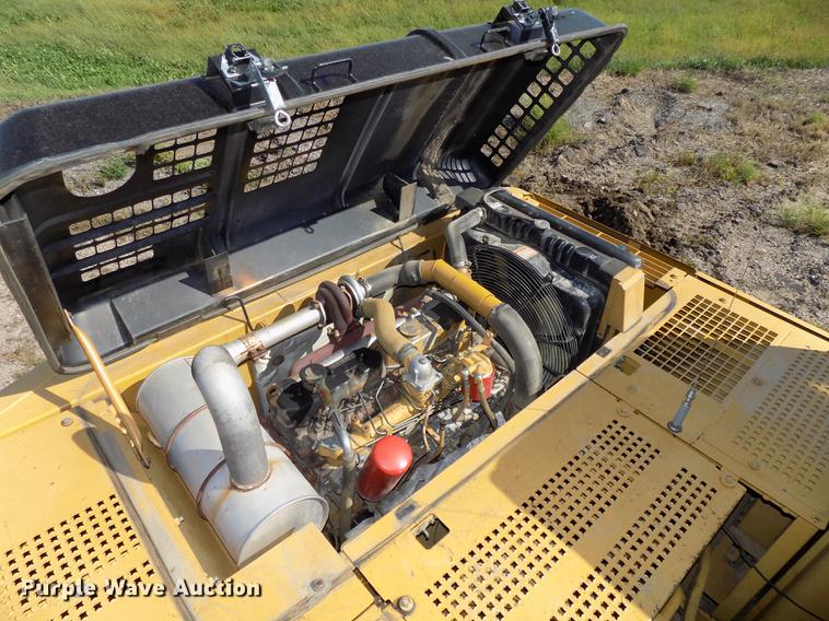 image for item DB8598 1999 Caterpillar 320B L excavator