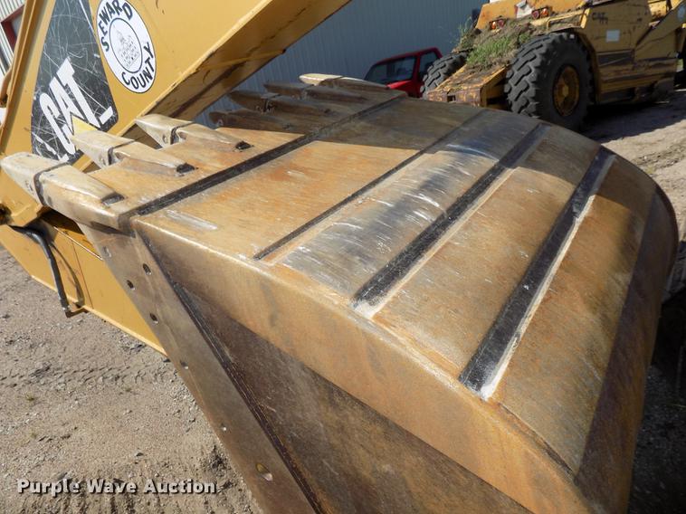 image for item DB8598 1999 Caterpillar 320B L excavator