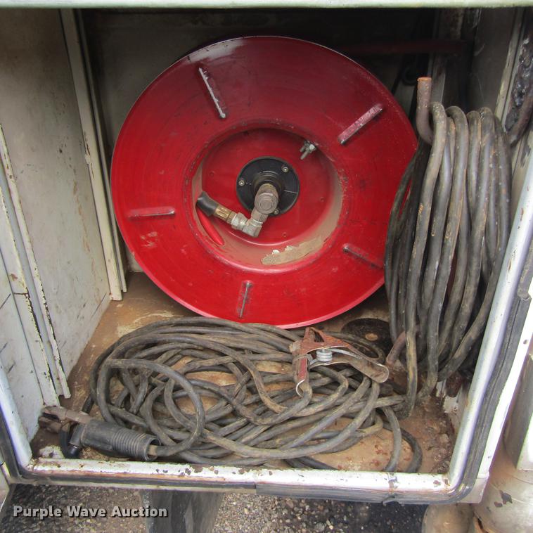 image for item DC0049 2007 GMC C6500 service truck with crane