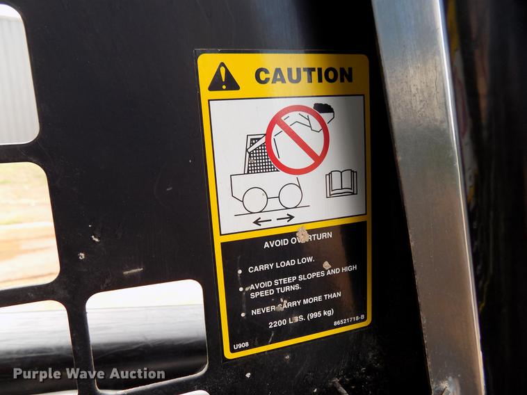 image for item DD5322 1999 New Holland LX885 Turbo skid steer