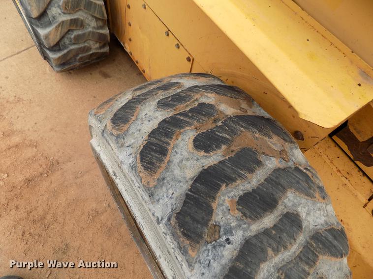 image for item DD5322 1999 New Holland LX885 Turbo skid steer