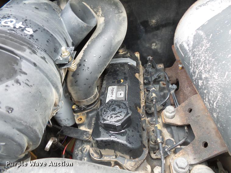 image for item FT9831 1999 John Deere 240 skid steer