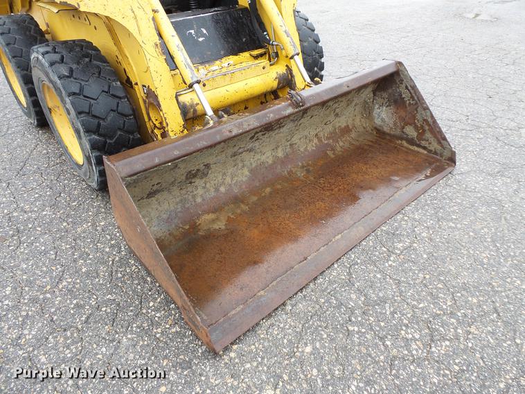 image for item FT9831 1999 John Deere 240 skid steer