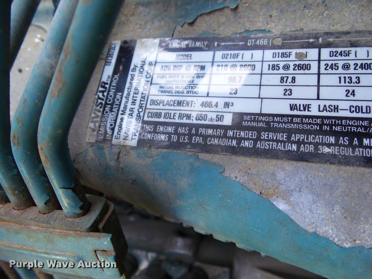 image for item L5702 1990 International 7100 flatbed truck with water tank