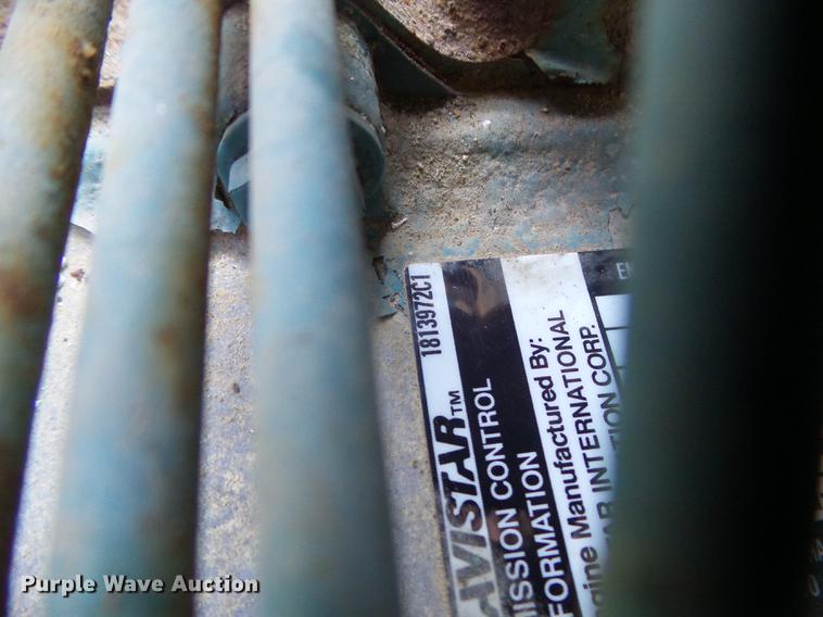 image for item L5702 1990 International 7100 flatbed truck with water tank