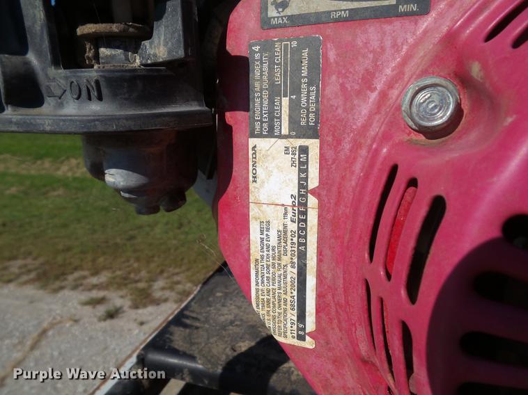 image for item L5702 1990 International 7100 flatbed truck with water tank