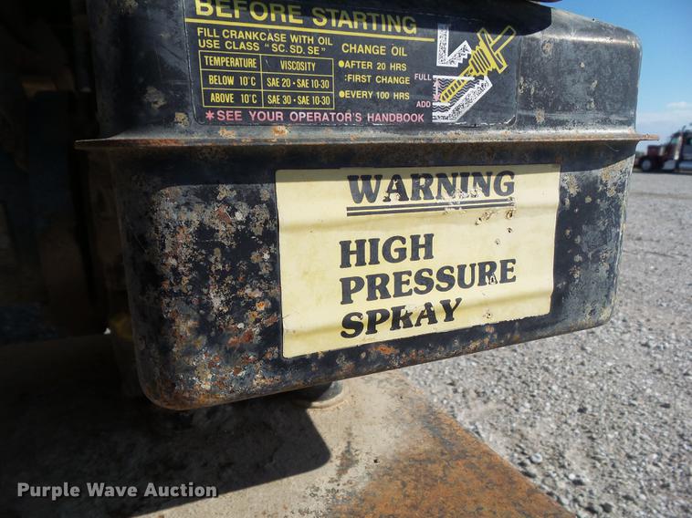 image for item L5702 1990 International 7100 flatbed truck with water tank