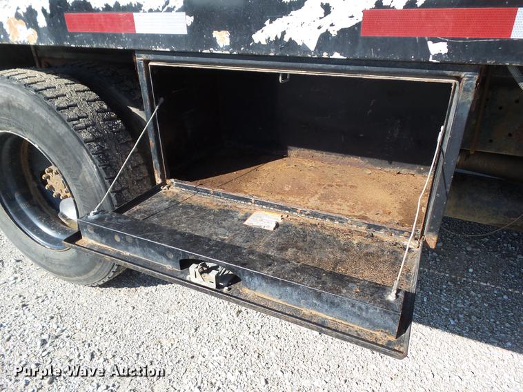 image for item L5702 1990 International 7100 flatbed truck with water tank