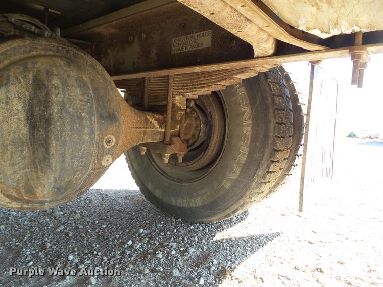 image for item L5702 1990 International 7100 flatbed truck with water tank