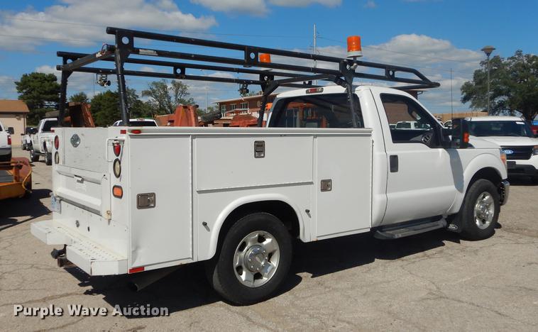 image for item DB8299 2011 Ford F250 Super Duty utility bed pickup truck