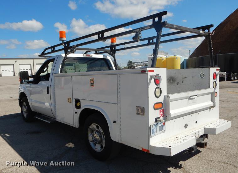 image for item DB8299 2011 Ford F250 Super Duty utility bed pickup truck