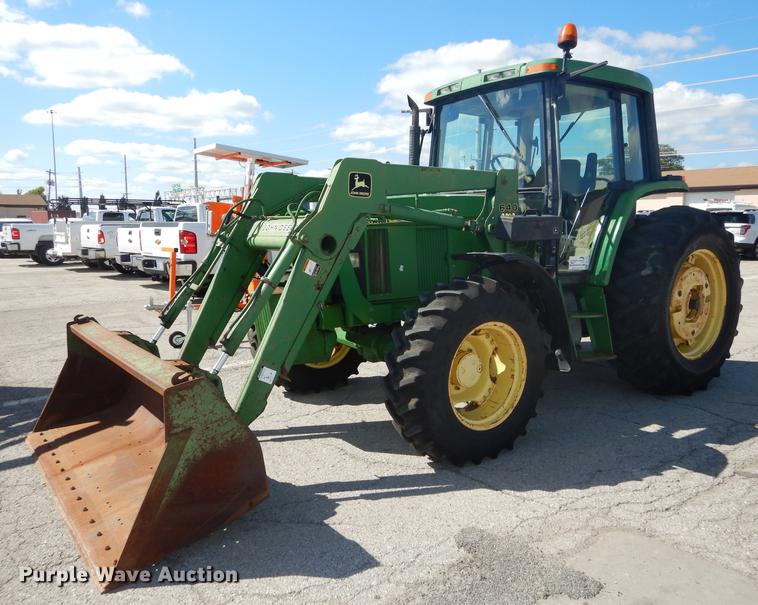 image for item DF1761 2001 John Deere 6310 MFWD tractor