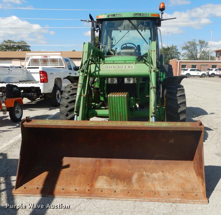 image for item DF1761 2001 John Deere 6310 MFWD tractor