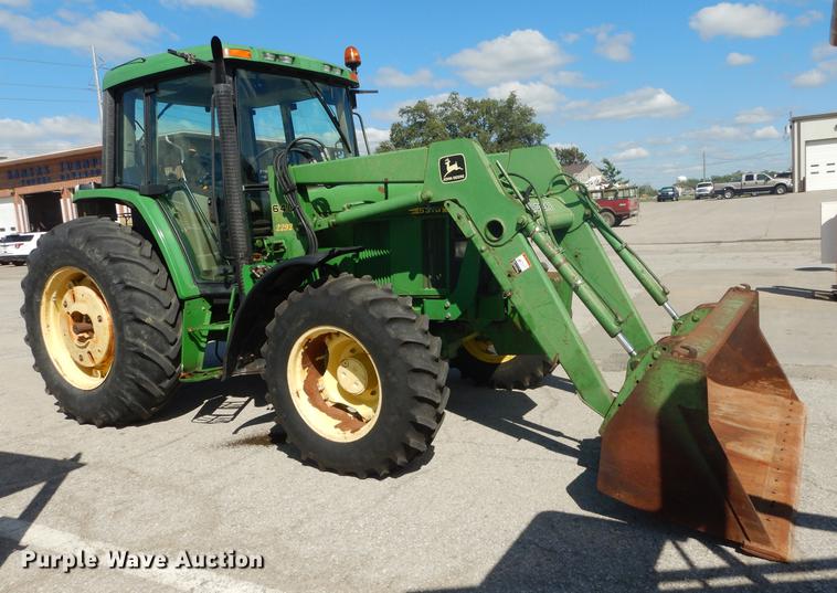 image for item DF1761 2001 John Deere 6310 MFWD tractor
