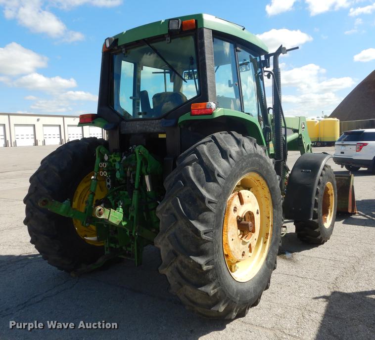 image for item DF1761 2001 John Deere 6310 MFWD tractor